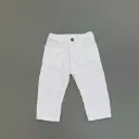  Pantallona te bardha unisex